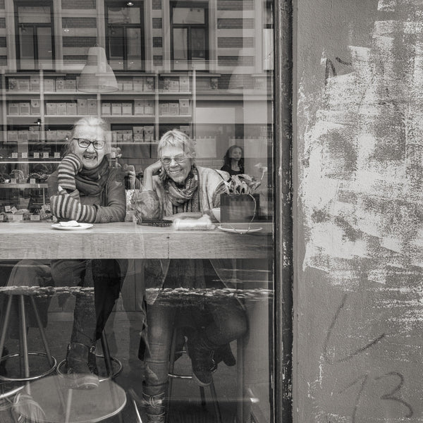 Couple of ladies in an Oslo Norway cafe | Photo Art Print fine art photographic print