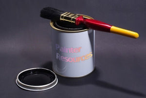 Paintbrush resting on an open tin labelled Painter Resources