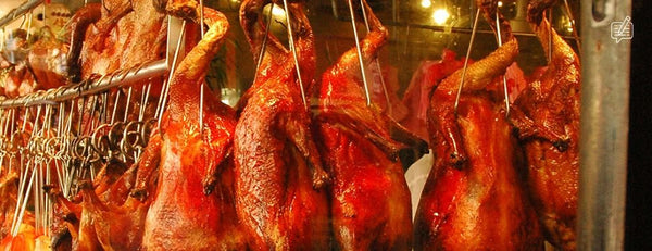 Couple walking through Beijing streets exploring the city and embracing curiosity through travel