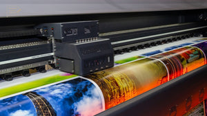 Large-format printer producing a colorful fine art photographic print