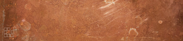 Copper wall art banner showing scratched reddish brown metal with outlined squares