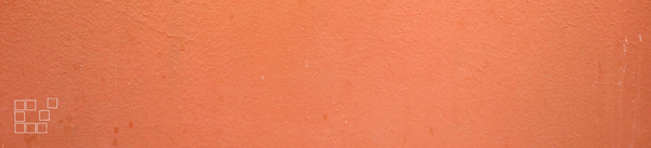 Peach wall art banner with softly textured orange pink plaster and outlined squares