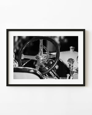 1912 Stutz Bearcat steering wheel and polished controls in black and white