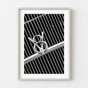  1932 Ford V8 chrome grille emblem in black and white