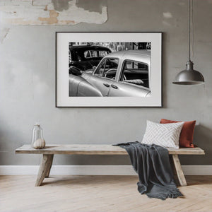 Black and white side view of classic Cadillac sedan