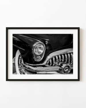 1953 Buick Roadmaster headlight, grille and chrome bumper in black and white
