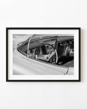 1956 Buick Centurion dashboard and steering wheel in black and white
