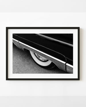 1956 Lincoln Capri whitewall tyre and rear fender in black and white