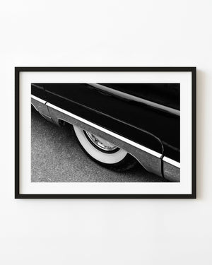 1956 Lincoln Capri whitewall tyre and rear fender in black and white