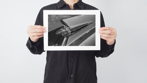 Detail of classic Cadillac rear fin in black and white