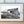 Load image into Gallery viewer, Abandoned Antarctic Cabin at Whalers Bay Station Amidst Untamed Nature fine art photographic print
