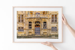 graffiti on ornate abandoned structure