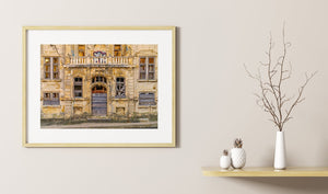 peeling plaster and boarded windows