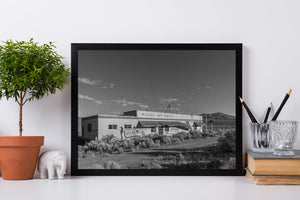 black and white photo of abandoned bathhouse