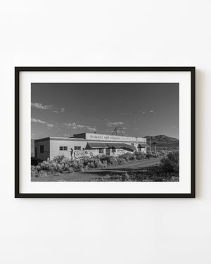 Abandoned Mineral Hot Springs building in Nevada with graffiti, black and white photography