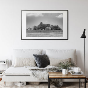 An abandoned farmhouse occupies a small part of a broad rural Ontario landscape