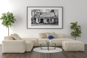 Black and white panoramic photograph of a deserted New York house