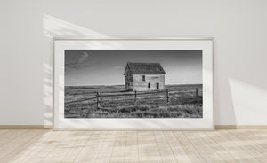 Black and white panoramic photograph of a rural Saskatchewan farmhouse