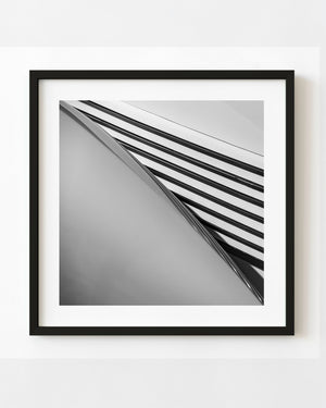 Diagonal hood louvres on a Cord roadster in abstract black and white detail.