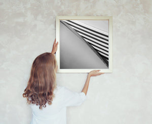 Repeated Cord hood vents spread toward the lower edge in black and white.