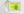 Sharp evergreen detail contrasts with broad blurred areas of yellow-green forest colour.