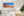 Warm desert cliffs contrast with a dark straight rail line and pale dry ground in the American Southwest.