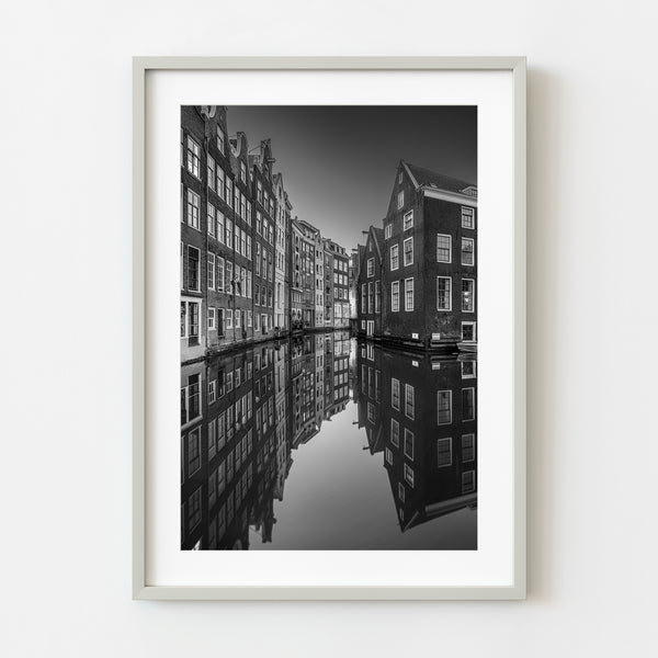 Amsterdam canal reflection black and white