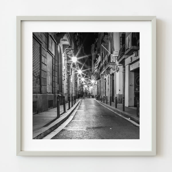 Quiet street in Barcelona at night in black and white