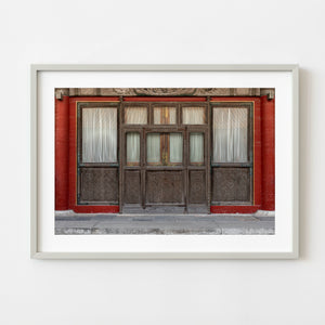 Ancient carved wooden doorway inside Beijing Forbidden City