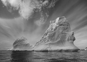 Towering iceberg with layered ice textures in Antarctica