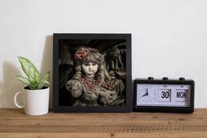 An antique doll with painted eyes, lace clothing and muted red ribbon accents.