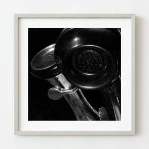 Close-up of vintage rotary phone handset – black and white