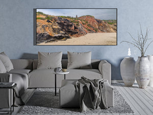 Panoramic view of Aquinnah clay cliffs, sandy beach and Gay Head Lighthouse.