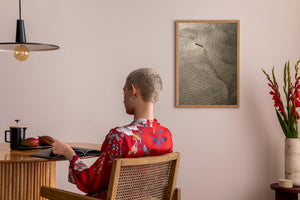 A dark ocean curve winds through softly lit Arctic water near Alaska.