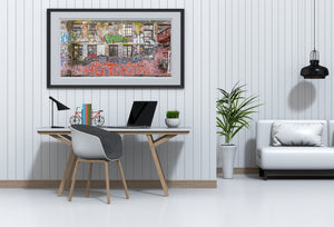 Graffiti-covered brick facade with barred windows