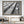 An elevated view turns train roofs and ventilation grilles into strong diagonal lines.