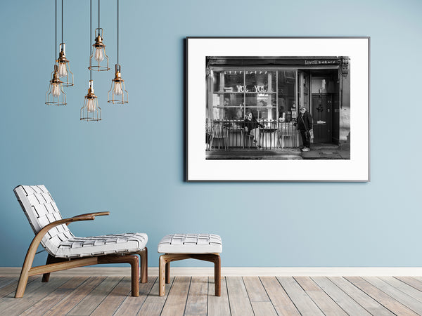 Two men outside Laveli Bakery in London – black and white street photo