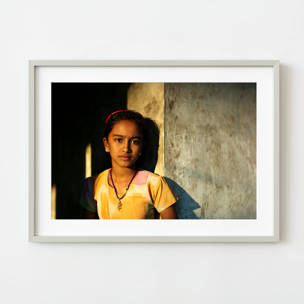 Young girl in golden sunset light