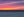 Pacific Ocean horizon beneath vibrant evening skies