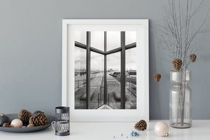 Vertical view through Titanic Museum glass toward Belfast harbour
