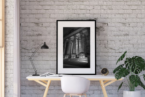 Repeated stone columns rise above broad shallow steps in Berlin