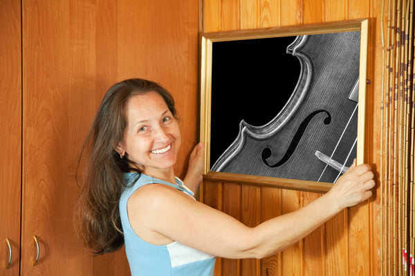 Fine detail of violin body in black and white photography