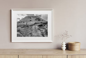 Natural rock and constructed masonry form a textured Blarney Castle view.