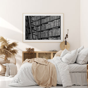Black and white photograph of old books and ladder rungs in Dublin