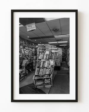 Boston bookstore interior filled with books in black and white