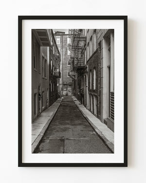 Boston service alley and fire escapes in black and white
