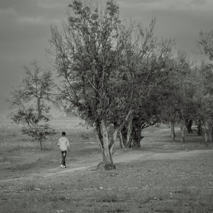 Tanzania rural landscape with child on dirt trail