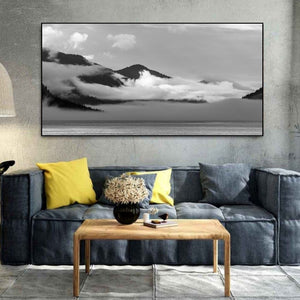 Bright cloud rises against a dark British Columbia mountainside.