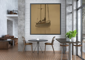 A sailboat’s masts and bow emerge from golden mist above still water.