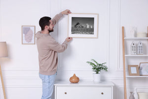 Historic barn overgrown with trees